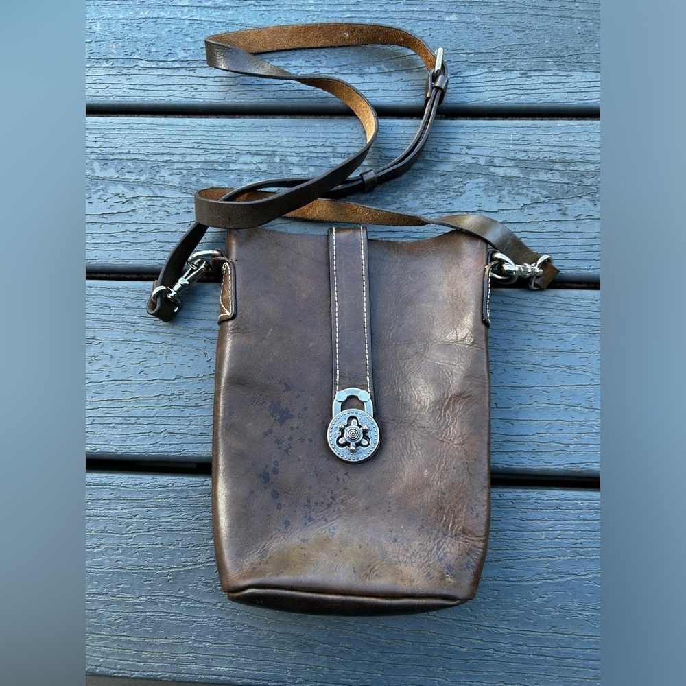 Bespoke handmade crossbody purse with artisan clasp